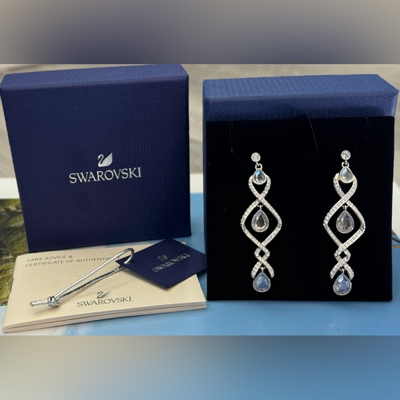 Swarovski Dangling Waterfall Design w/Pave Earrings w/a slight blue tinge 2&3/8”